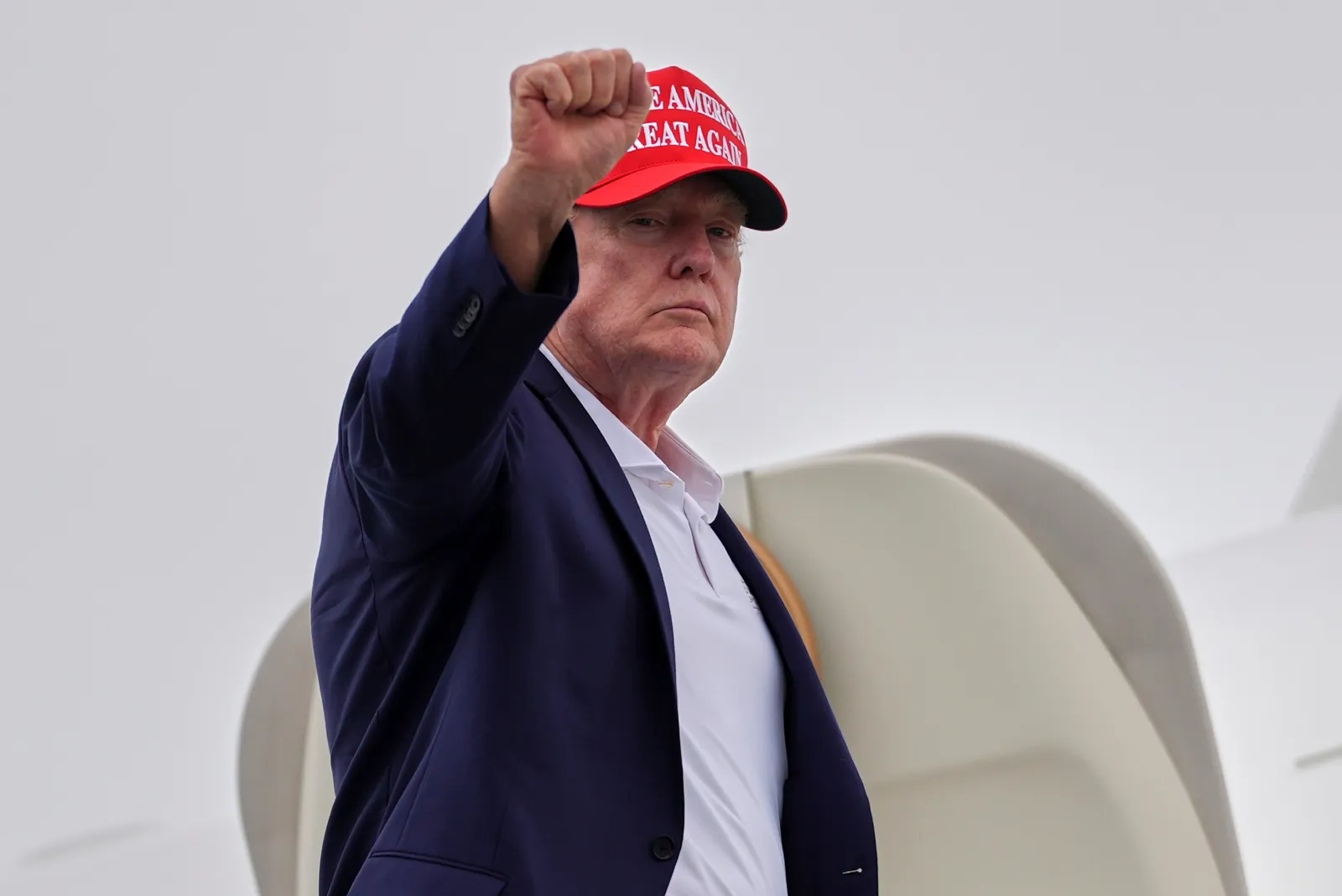 President Donald Trump gestures as he boards Air Force One at Morristown Airport on August 16, 2026, in Morristown, New Jersey.