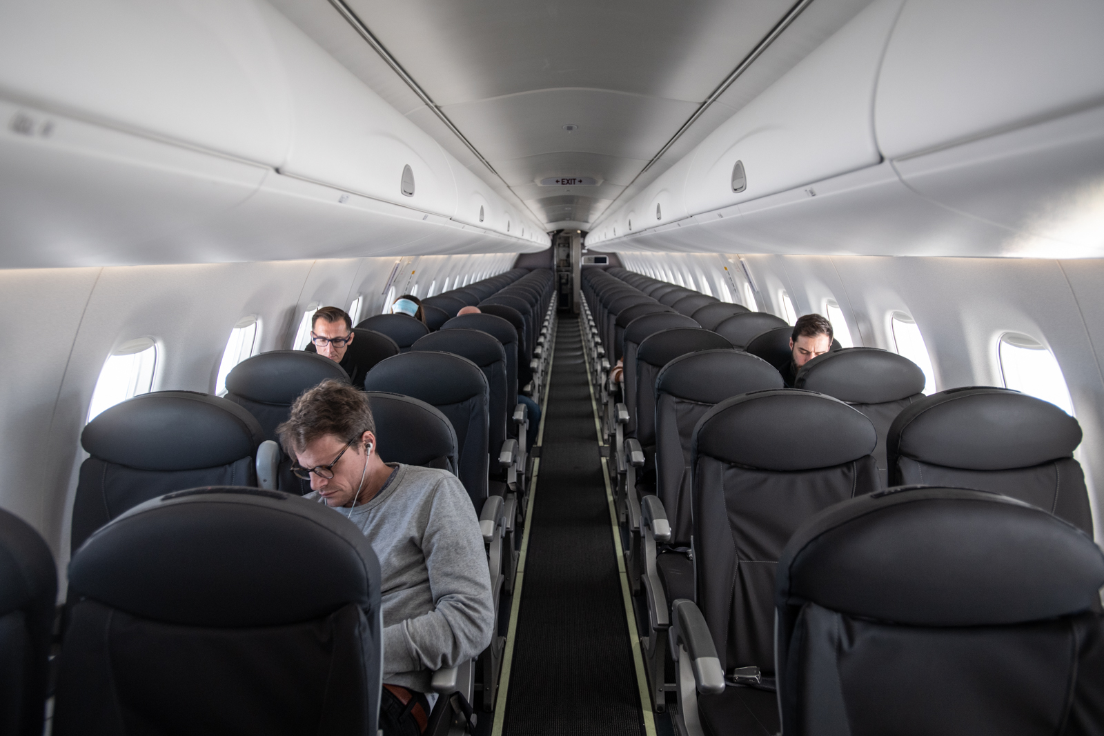 Plane Passengers Sneak into Exit Row—Not Ready For 'Walk of Shame' After