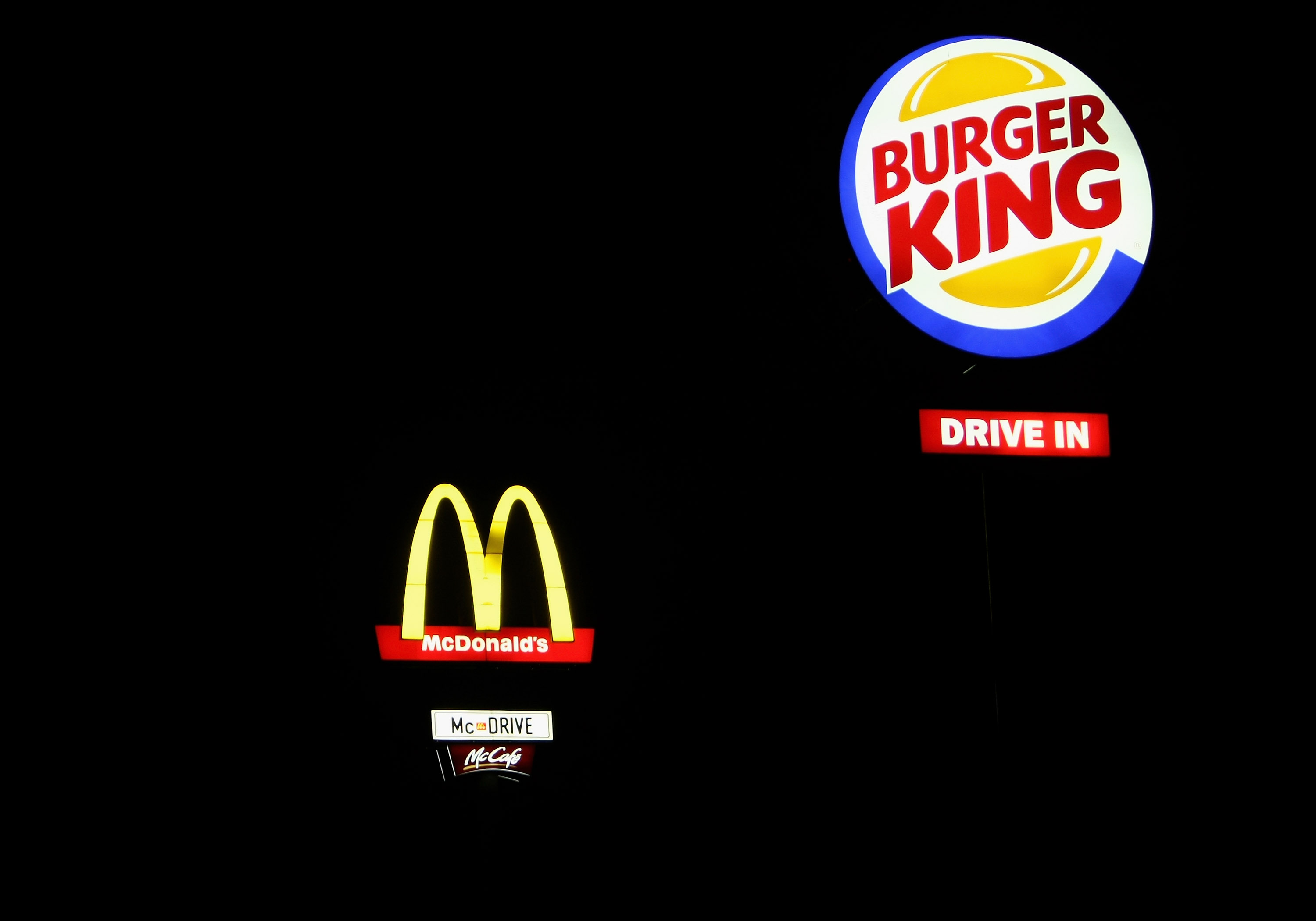 Ronald McDonald and Burger King Mascot Share Kiss in 'Love