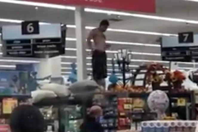 Officer Shot Inside Los Angeles Grocery Store, Suspect in Custody ...