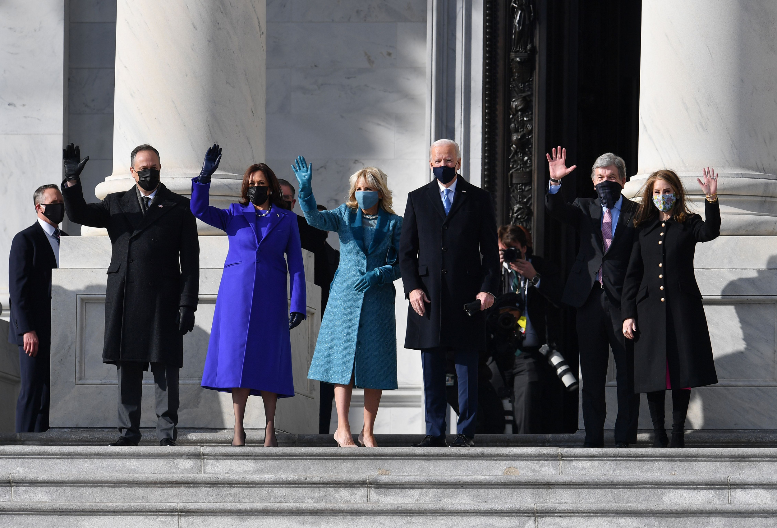 harris dressed in purple Kamala Harris Recycles Lilac Suit and Pearls for Las Vegas Rally