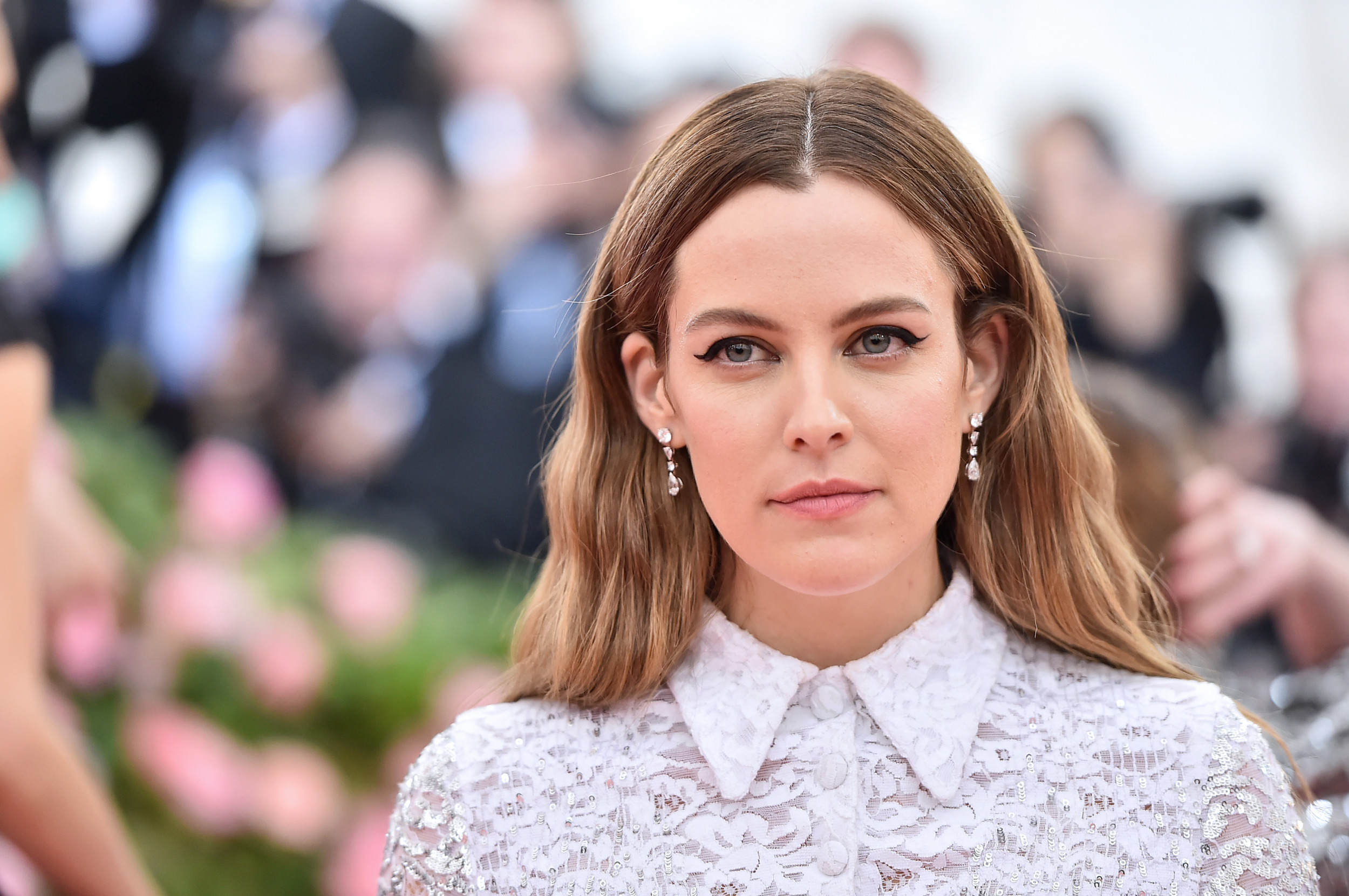 What Is a Death Doula? Elvis Presley's Granddaughter Riley Keough Completes Training - Newsweek