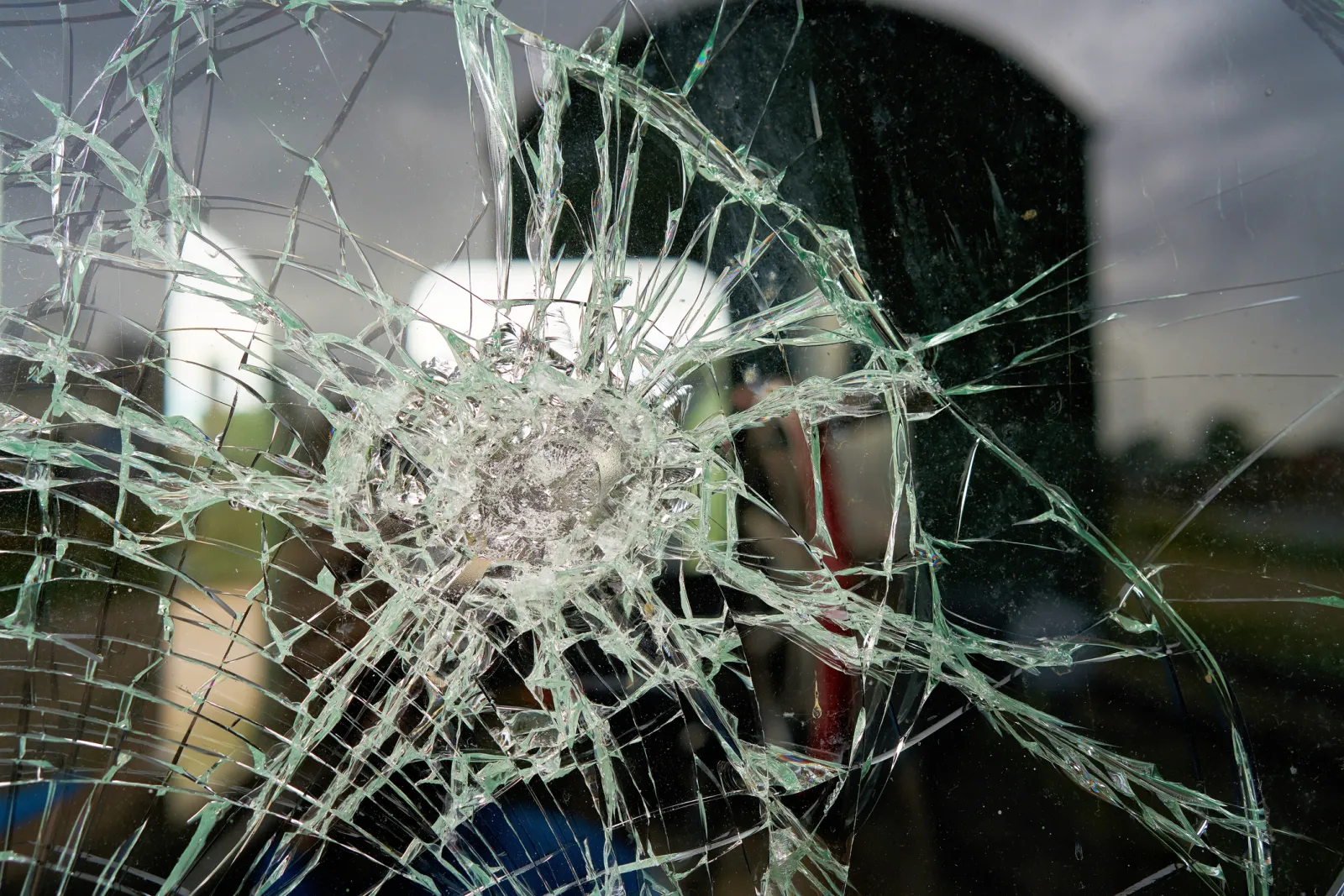Watch: Suspect Hurls Axe in Violent Road Rage Incident - Newsweek