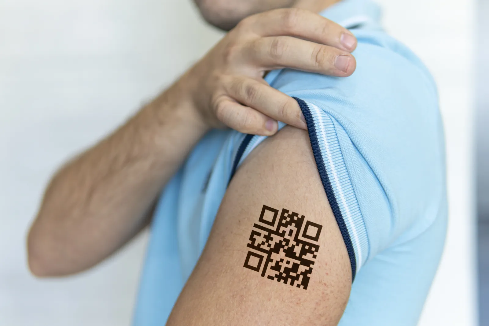 Man Gets QR Code Vaccine Passport Tattooed on His Arm - Newsweek, image size:1600x1066