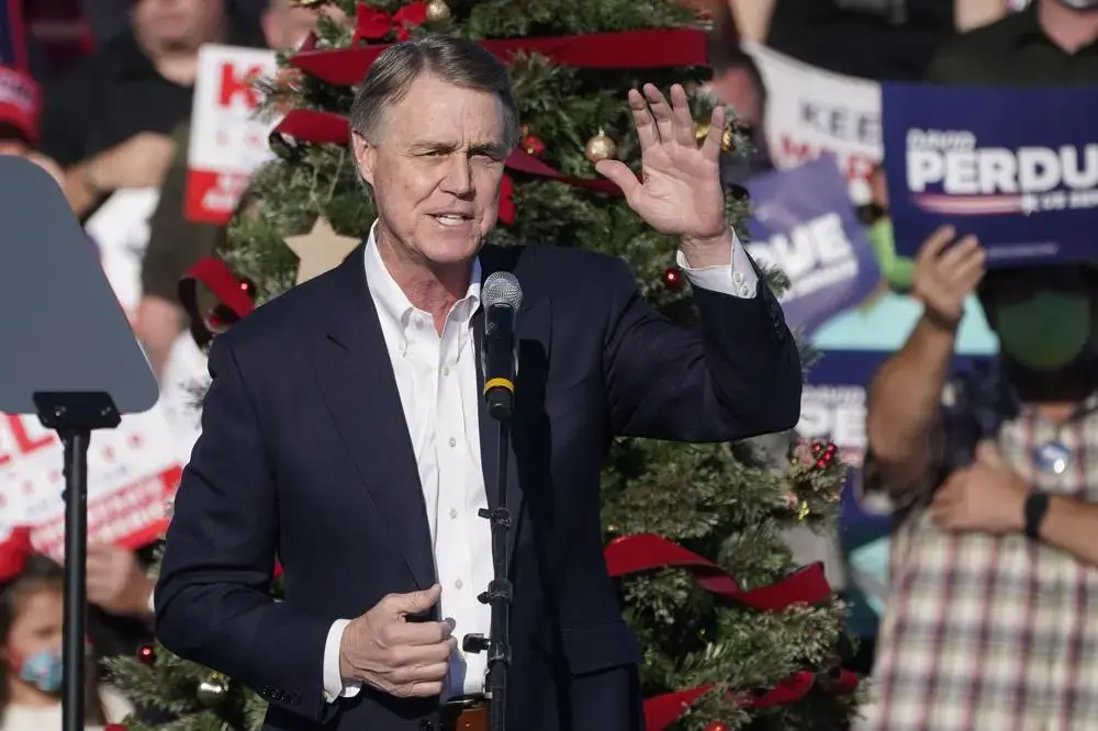 Brian Kemp-Backed Group Targets ‘Crooked Insider’ David Perdue in Georgia Governor’s Race
