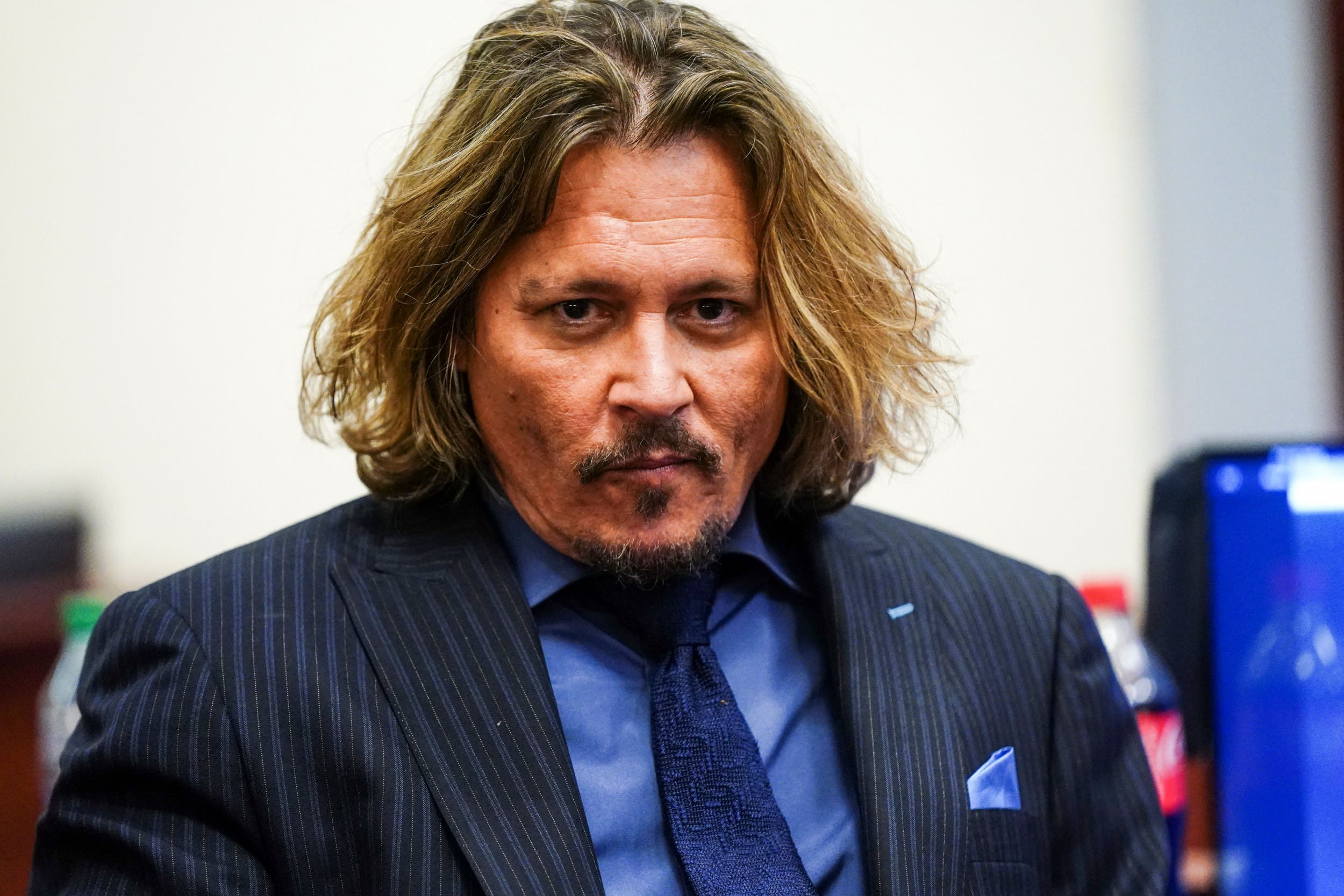 Watch: Johnny Depp Smirks At 'Boring Old Men' Remark During Court Testimony