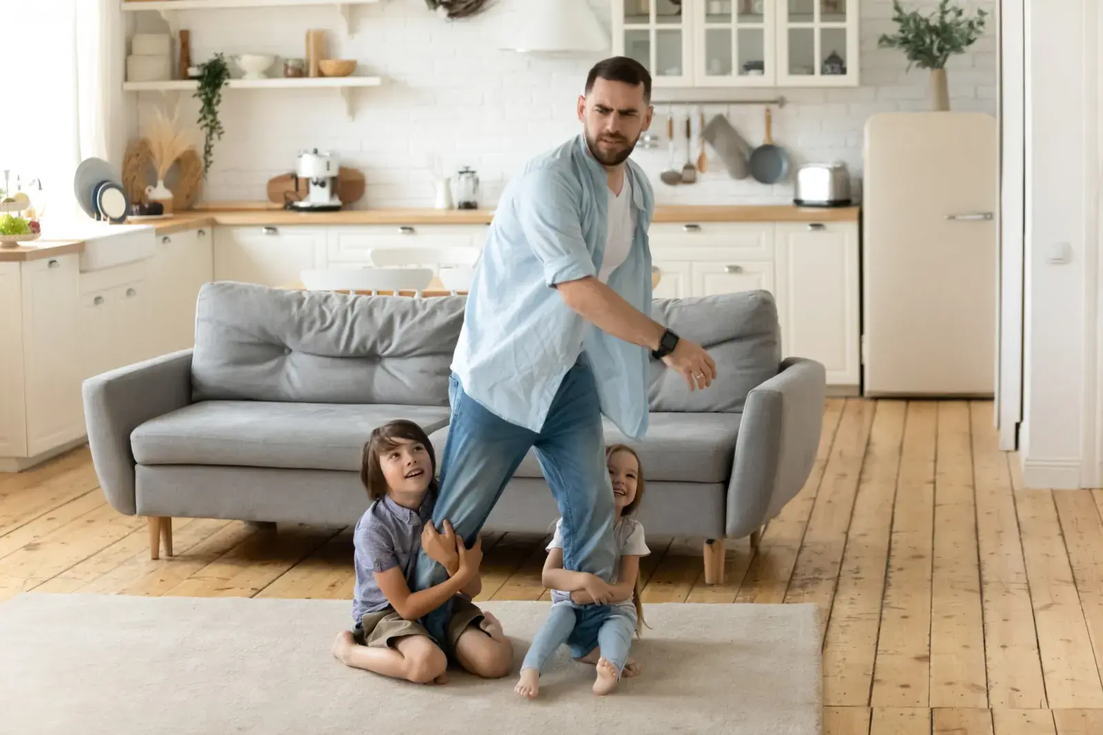 Man overwhelmed by nieces and nephews