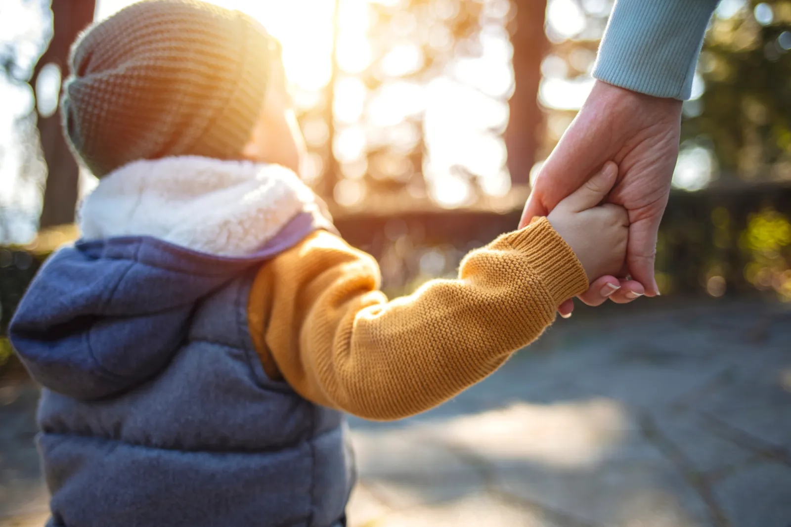 Child Holding Parent's Hand
