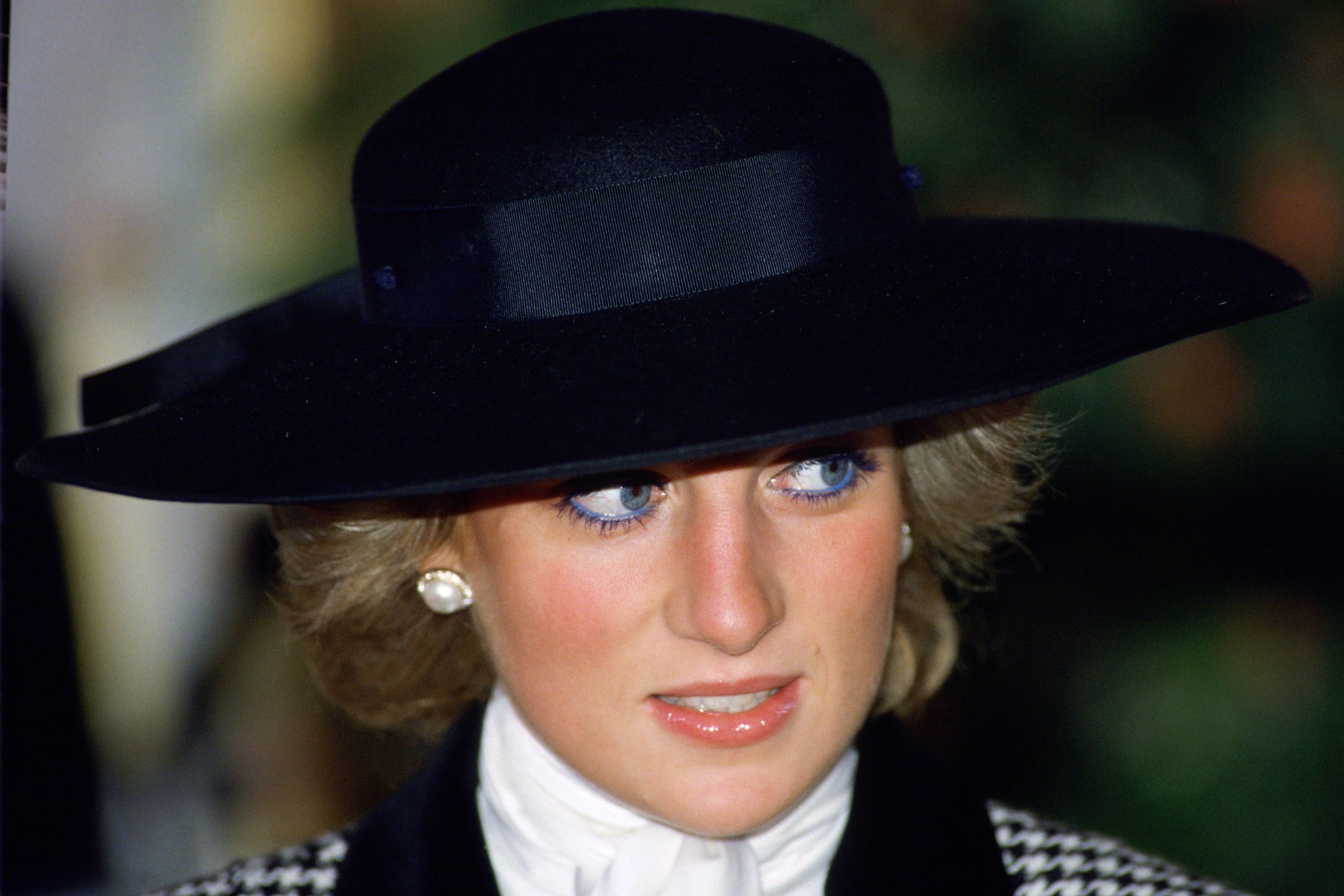 princess diana black dress hat Princess Diana and Prince Charles during a visit to the Yokohama War Cemetery, Japan., Diana wore a black Chanel suit and a hat by Philip Somerville. , November 11 1990. -, -, -, -, #ladydiana