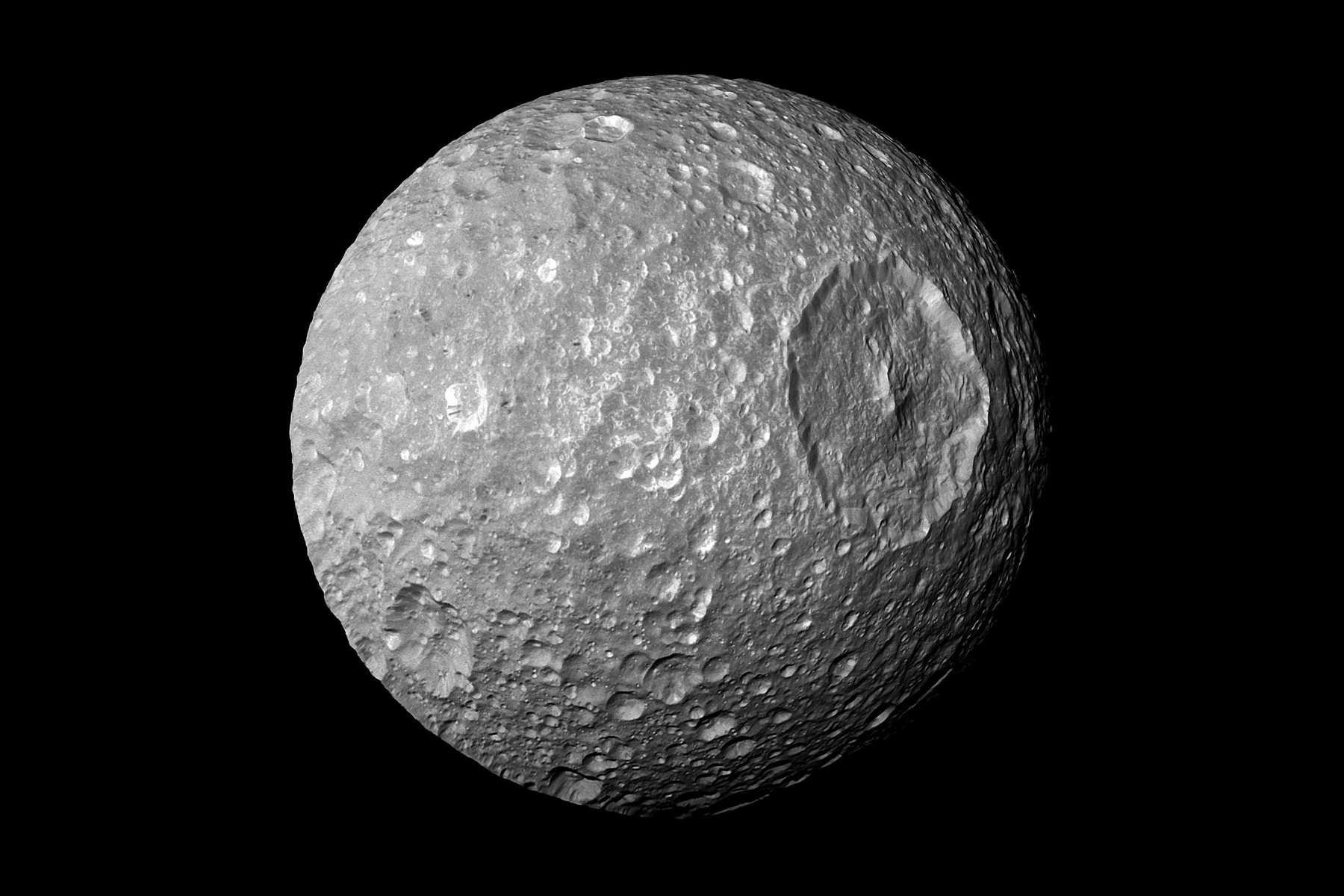 moon Saturn's 'Death Star' Moon Might Be Hiding a Secret Ocean - Newsweek