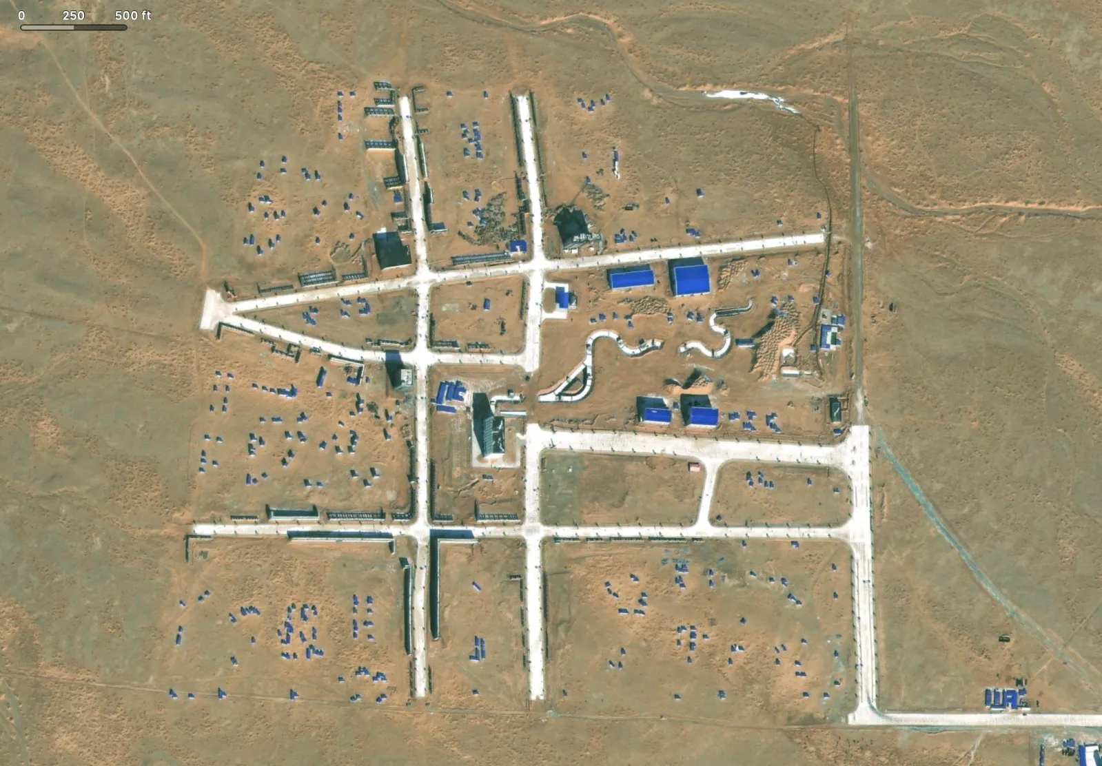 Satellite Images Reveal Chinese Military's Mock Targets in Desert - Newsweek