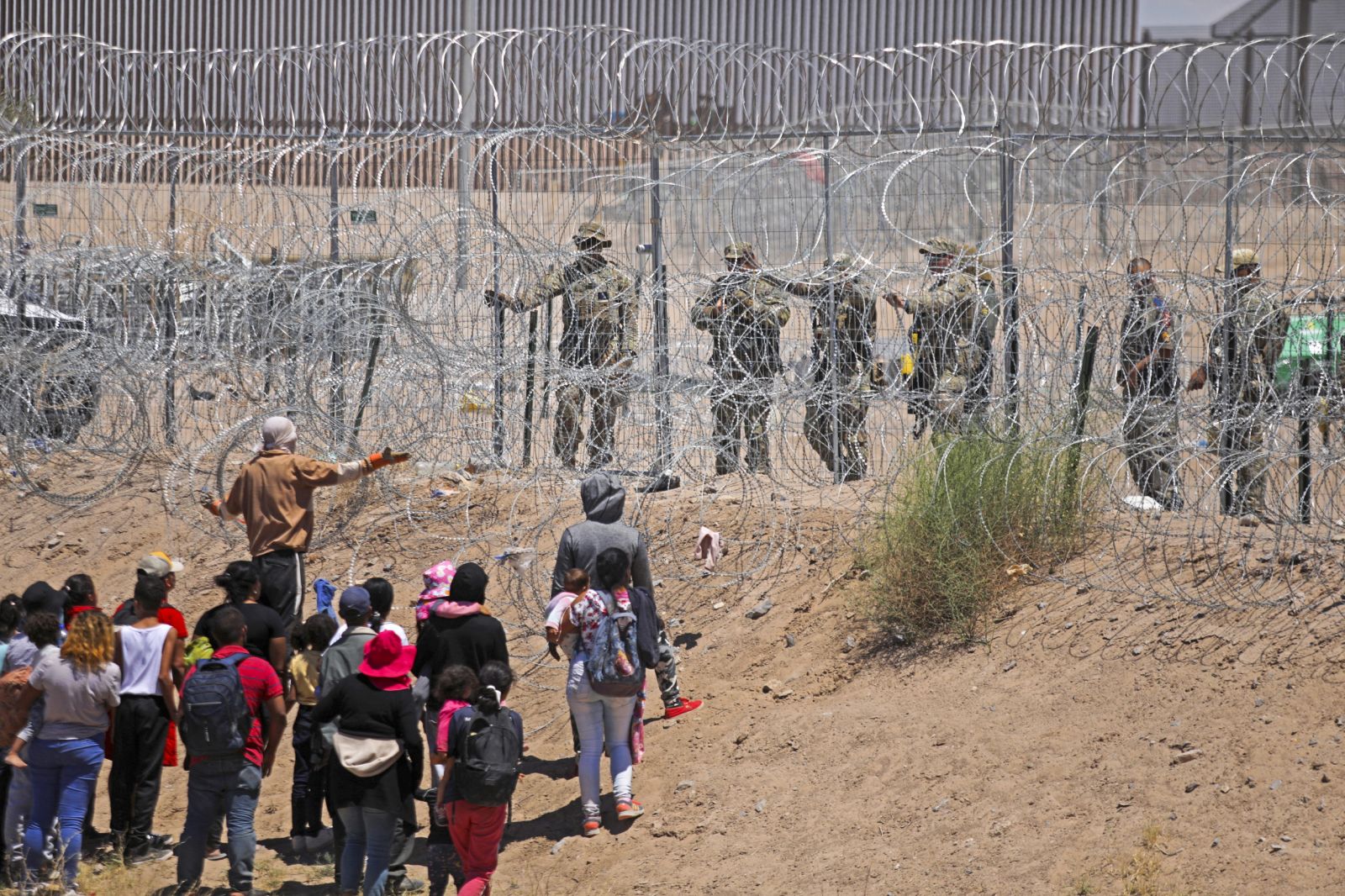 Texas Guards Pepper Spray Migrants at US Border - Newsweek