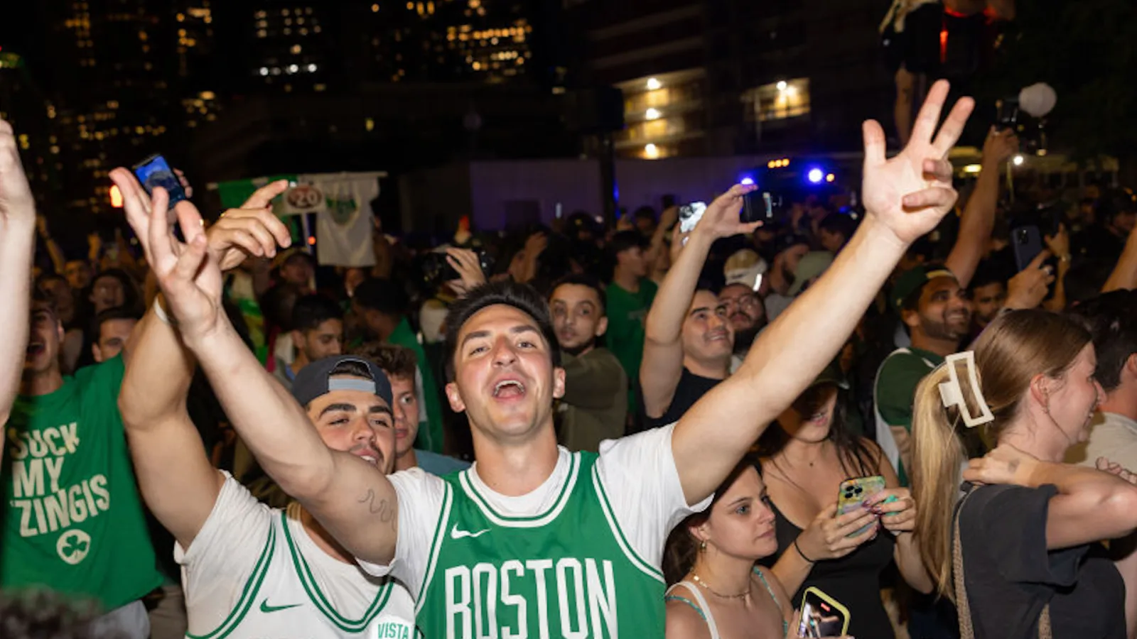 2412155-celtics-fans-celebrate-victory.jpg?w=1600&quality=80&webp=1