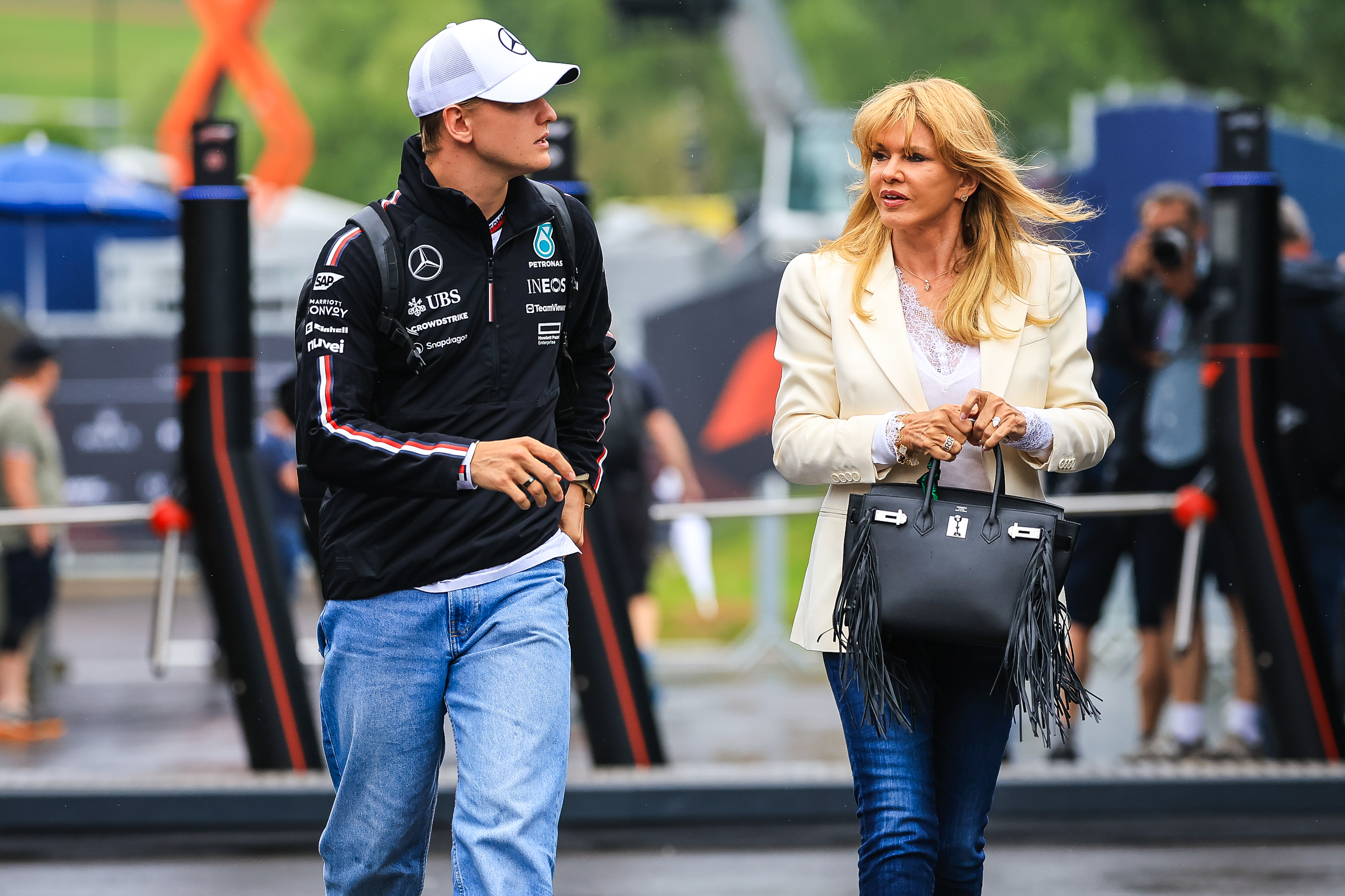 Corinna Schumacher Steps Out In Support Of Son Mick In Alpine Fight -  Newsweek
