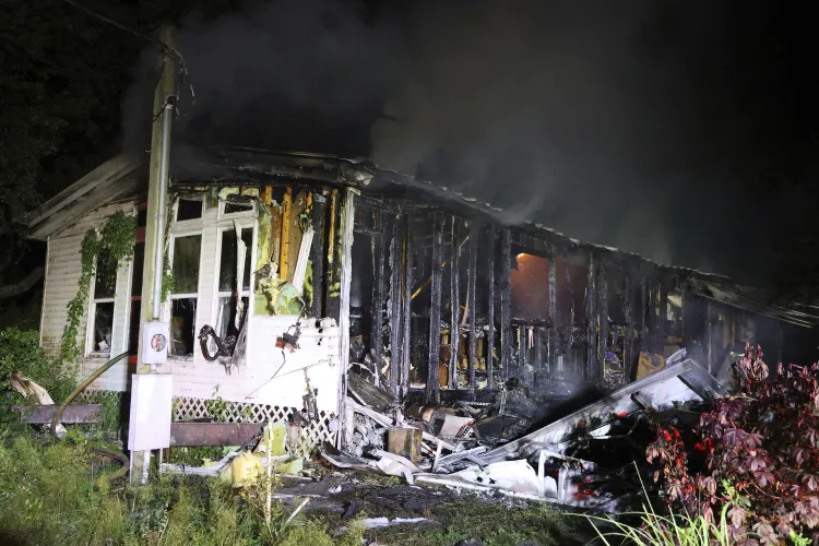 Man Charged With Murder After Fire Trapped and Killed 3 People, 5 Dogs ...
