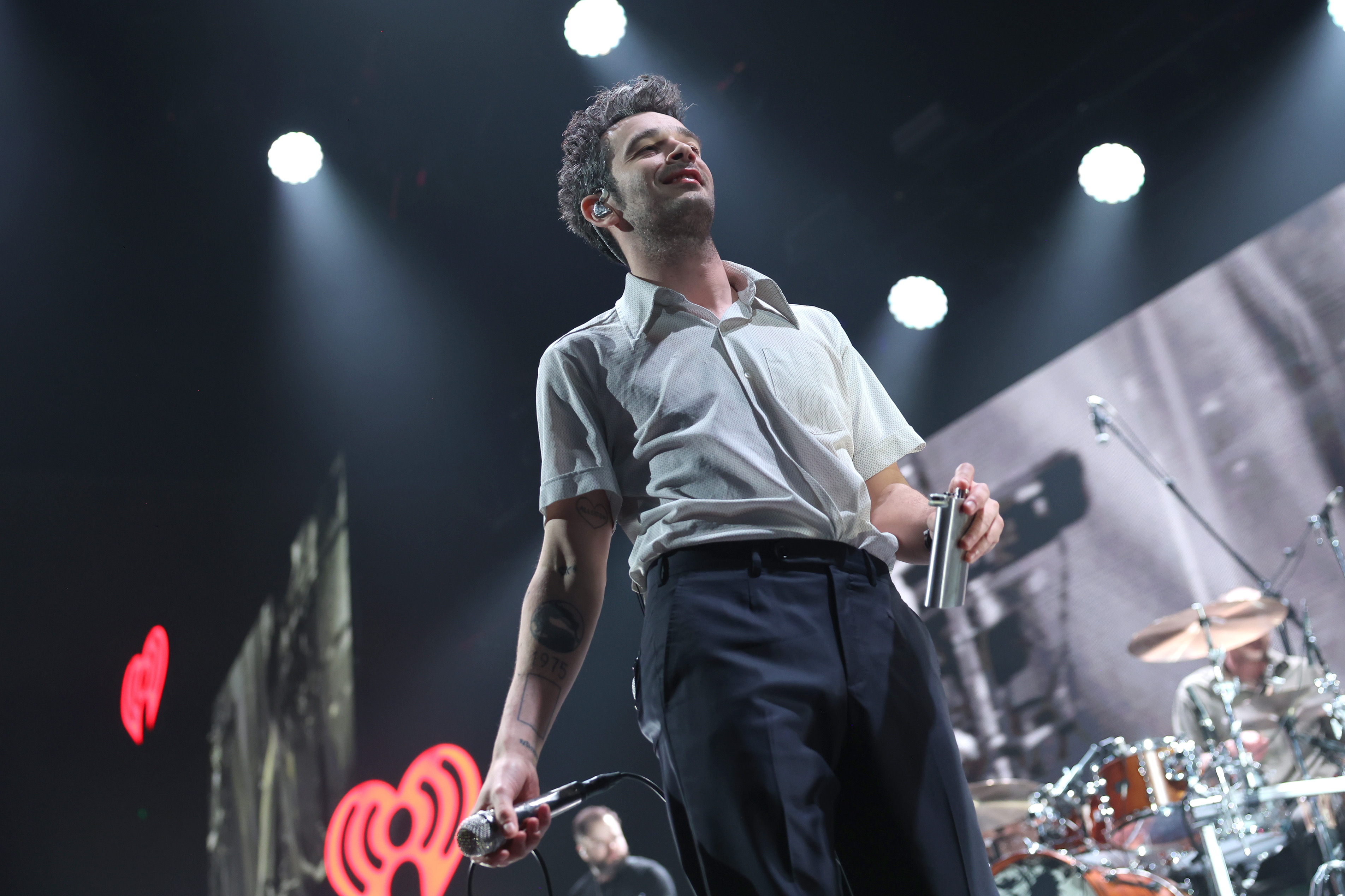 The 1975 Sued After Matty Healy Kiss - Newsweek