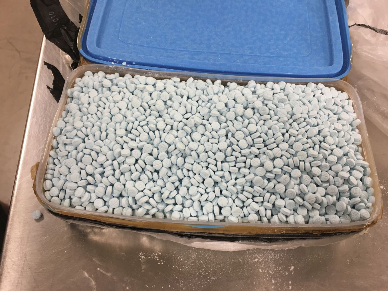 Two Men Arrested, Police Say 10,000 Fentanyl Pills Seized - Newsweek