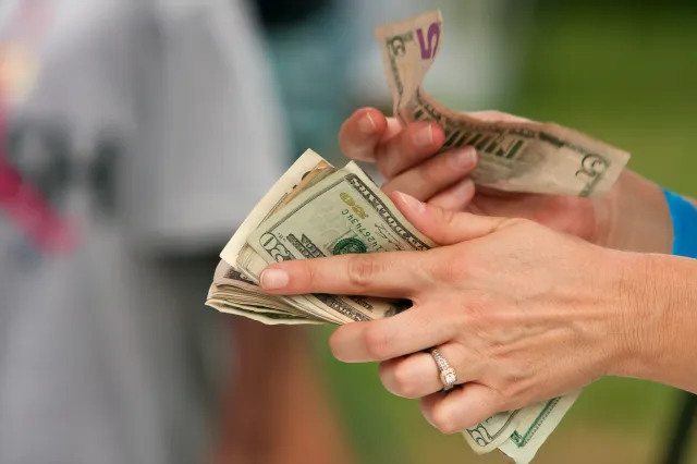 Hands counting money