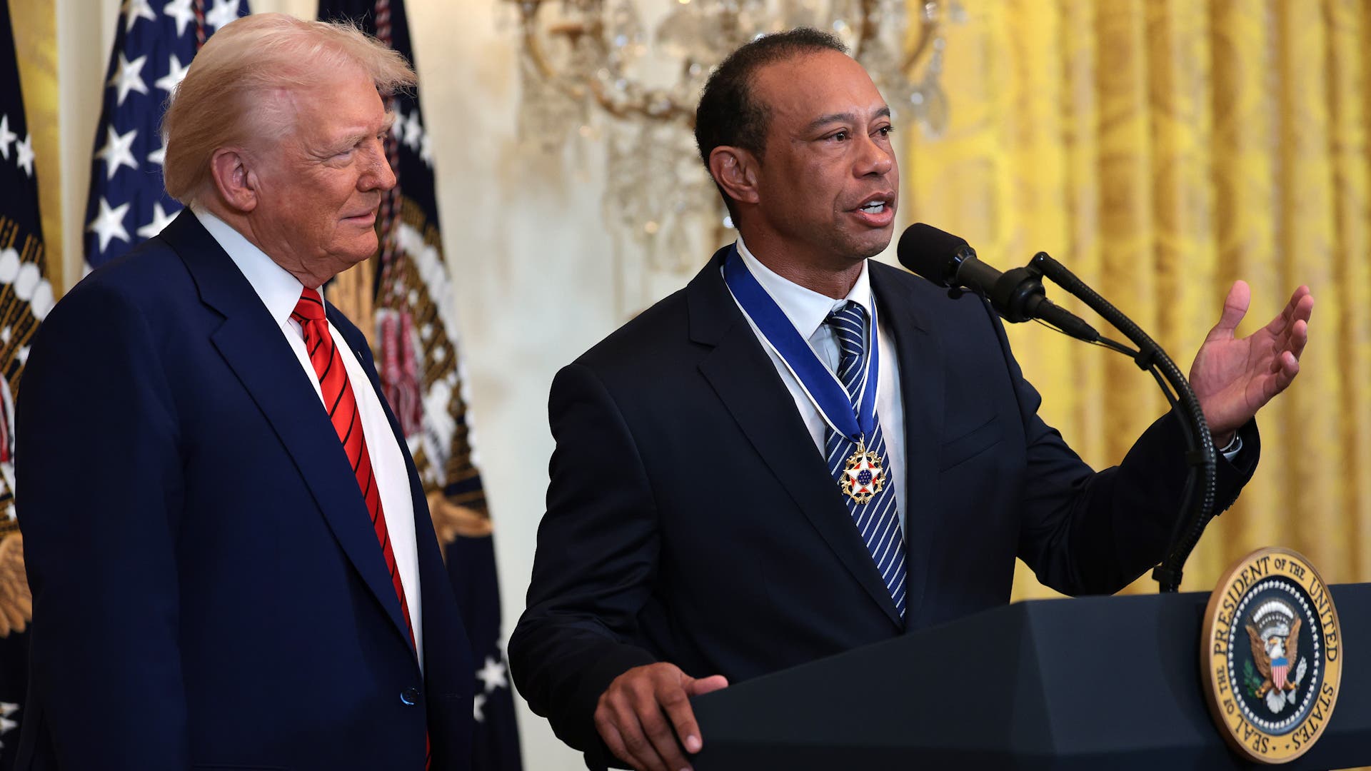 Trump Takes Stage With Tiger Woods At Black History Month Reception