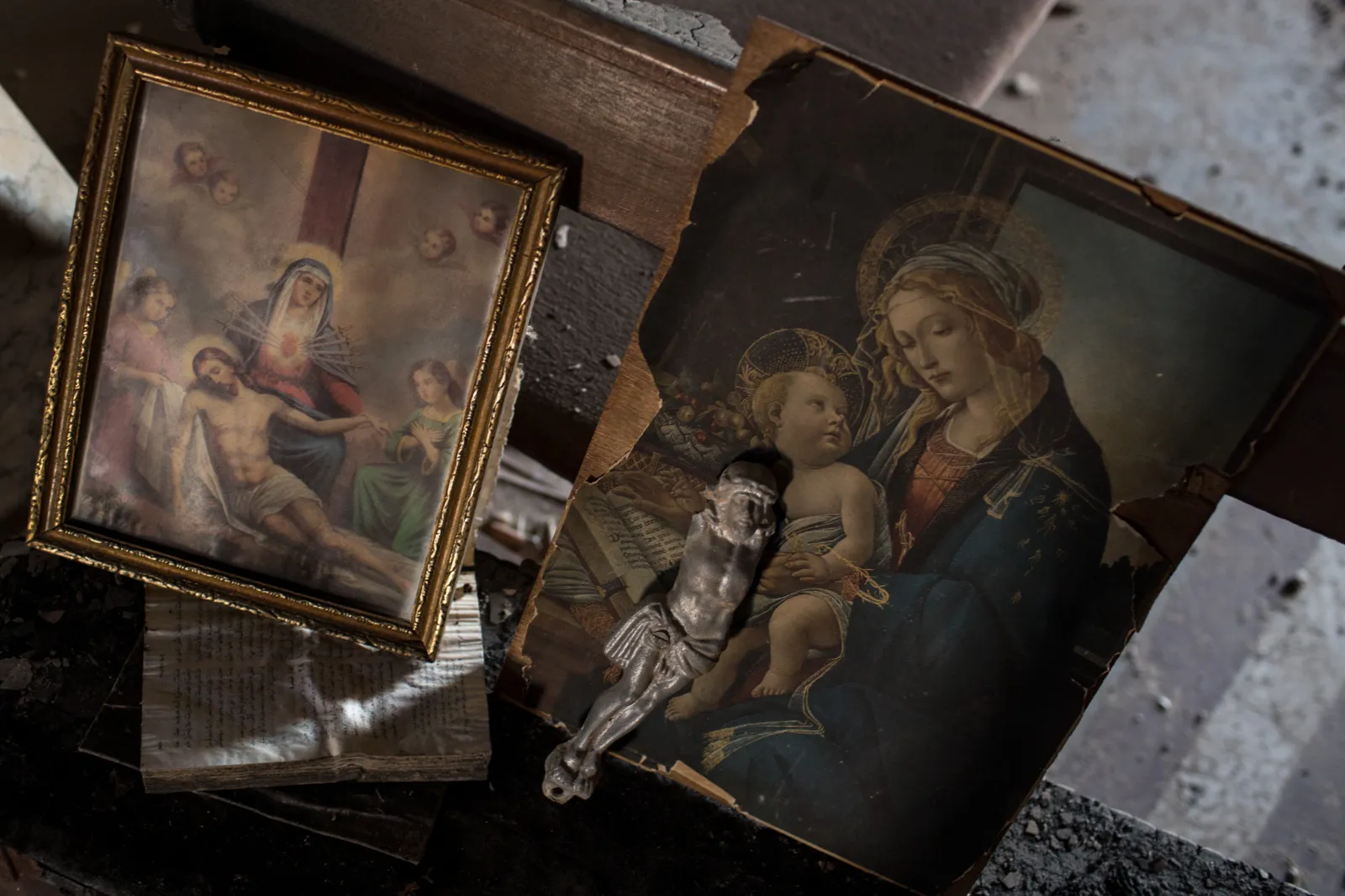 Damaged prints of Jesus Christ are seen