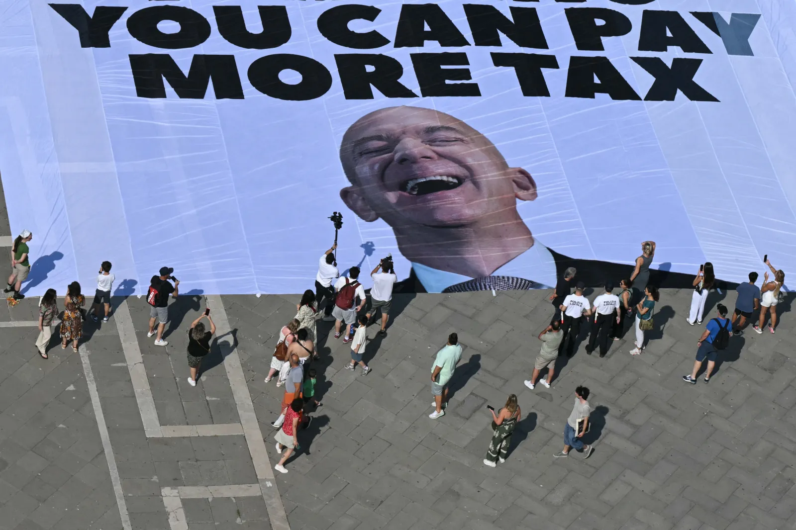 Giant Banner of Jeff Bezos’ Face Unveiled by Protesters in Venice ...
