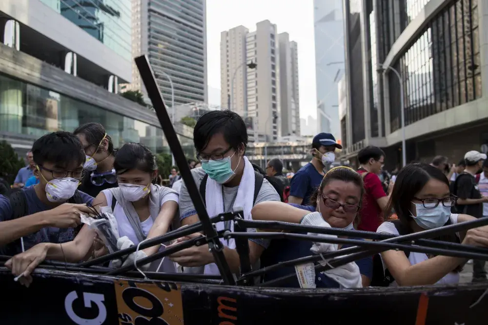 Hong Kong Anti-Protest Group Tear Down Barricades