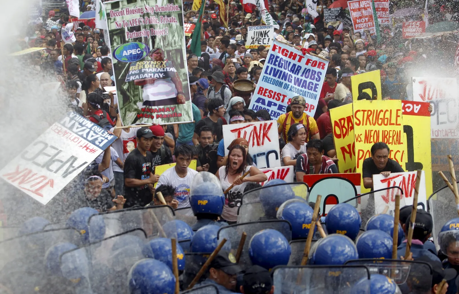 Police and Protesters Clash on Final Day of APEC Summit - Newsweek