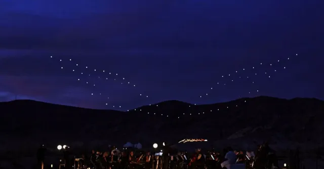 Watch: 100 Synchronized Drones Put on a Light Show Above Mojave Desert ...