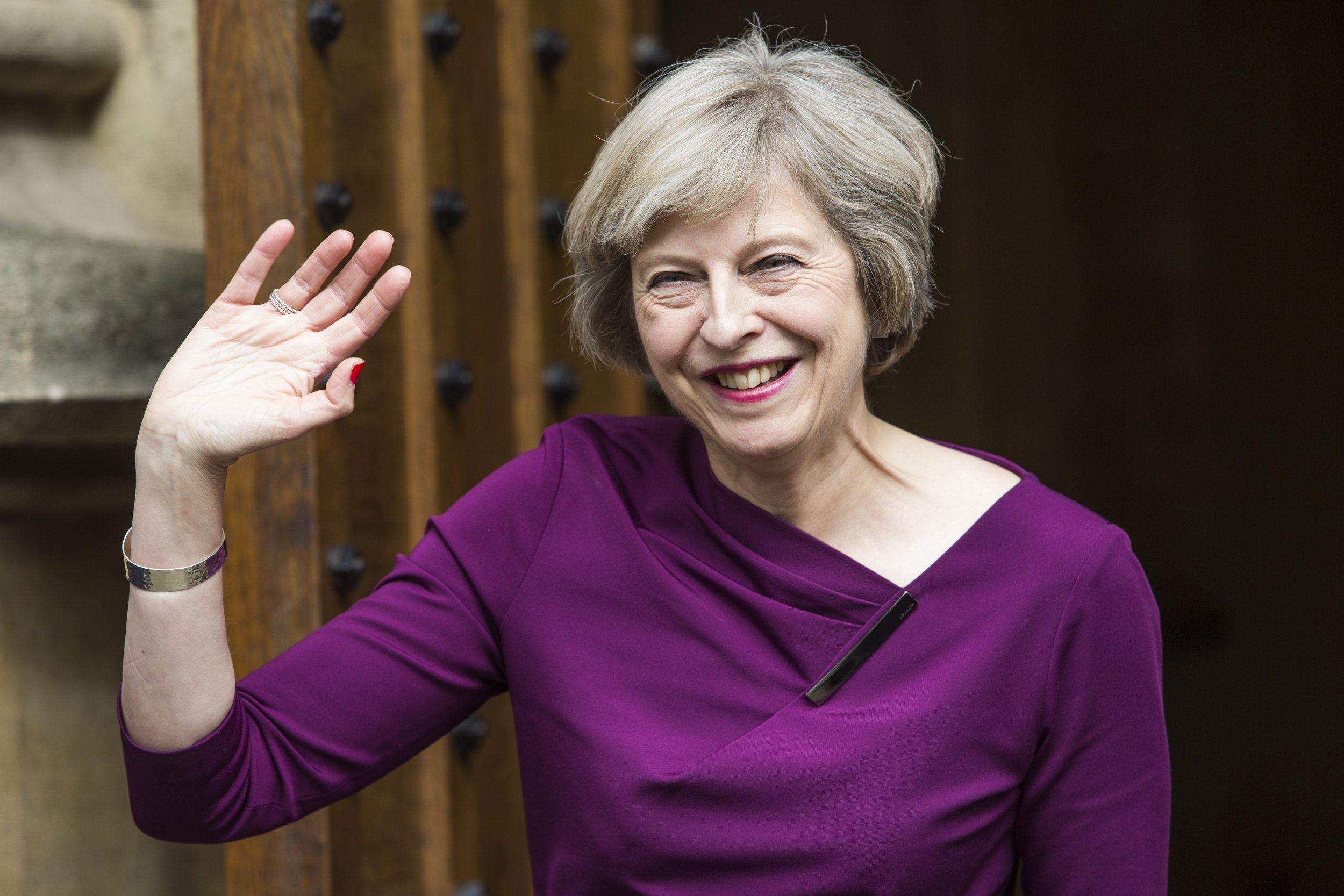 theresa may purple dress Theresa May: A Political Life In Pictures | British Vogue