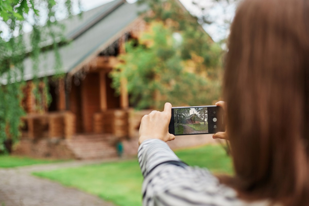 Woman confused why people are taking photos of her house,...
