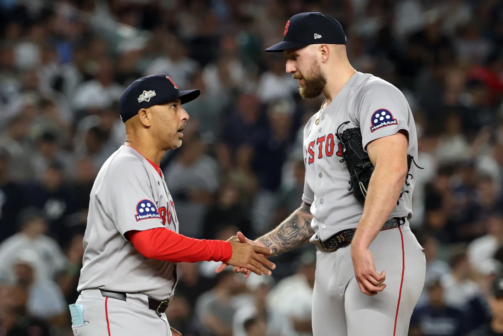 Boston Red Sox manager Alex Cora and pitcher Garrett Crochet