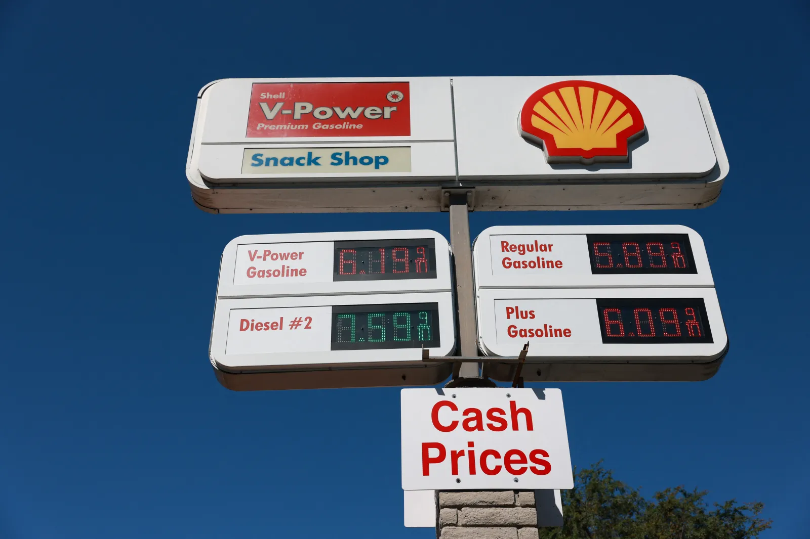Premium gasoline prices above $6 per gallon and diesel fuel prices above $7 a gallon are displayed outside of a Shell gas station in West Hollywood, California on April 14, 2026. The US Treasury Department said on April 14 that it does not plan to renew a temporary easing of sanctions on Iranian oil that aimed to ease war-related supply shocks. (Photo by Patrick T. Fallon / AFP via Getty Images)