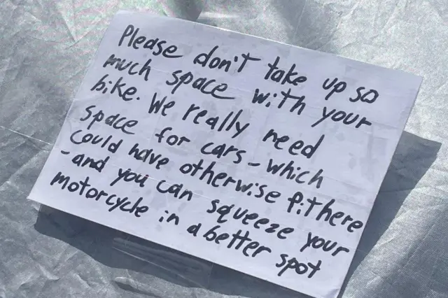 Note left on motorcycle.