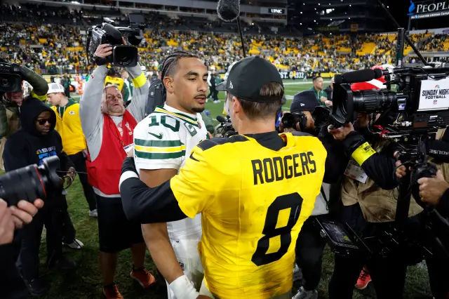 Jordan Love #10 of the Green Bay Packers greets Aaron Rodgers #8 of the Pittsburgh Steelers
