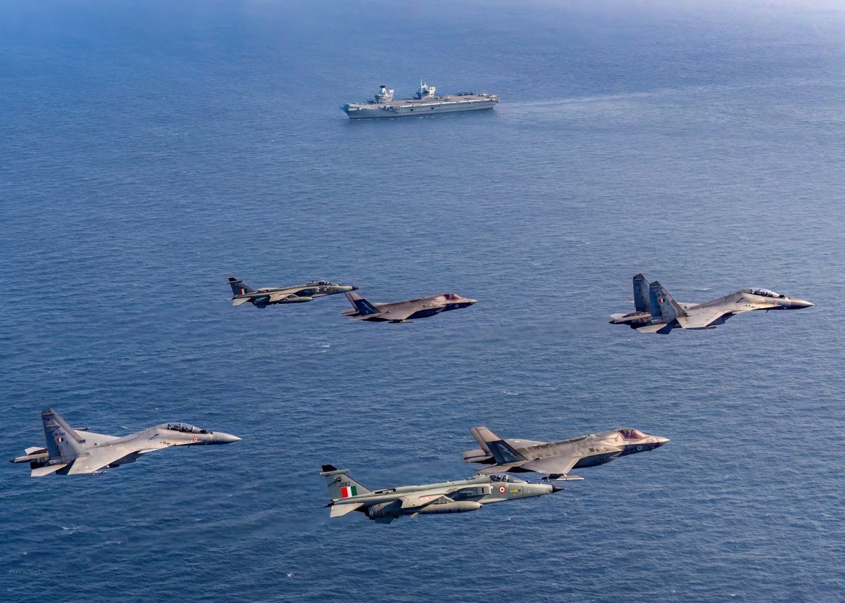 British Aircraft Carrier Stages Defense Drills Against Jet Attacks