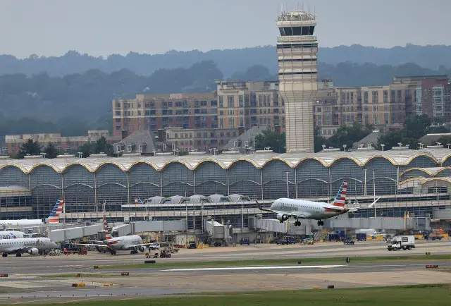 A plane comes into land at Reagan National Airport in June 2025.