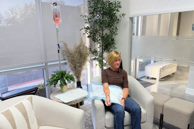 Andrea Steinbrenner receives an IV infusion at Pure Alchemy Wellness, on November 11, 2025, in Chula Vista, California.