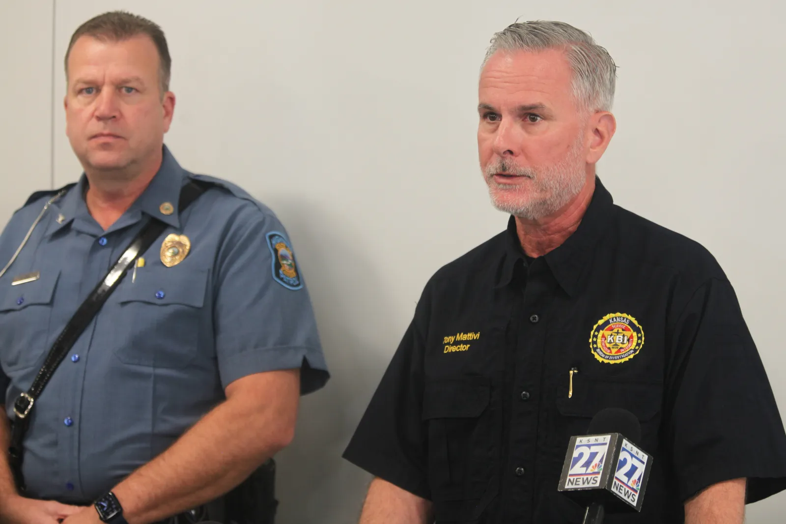 Kansas Bureau of Investigation Director Tony Mattivi, right, speaks at a news conference about a domestic violence incident that resulted in multiple casualties on November 15 in Carbondale, Kansas. Kansas Highway Patrol Superintendent Erik Smith is seen standing left. (AP Photo/John Hanna)