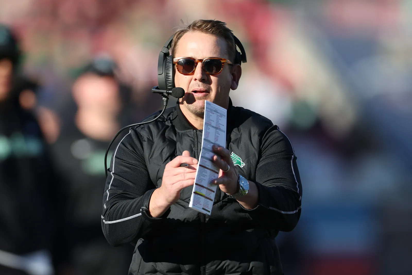 College football head coach Eric Morris of the North Texas Mean Green is taking the job at Oklahoma State amid a potential College Football Playoff run.