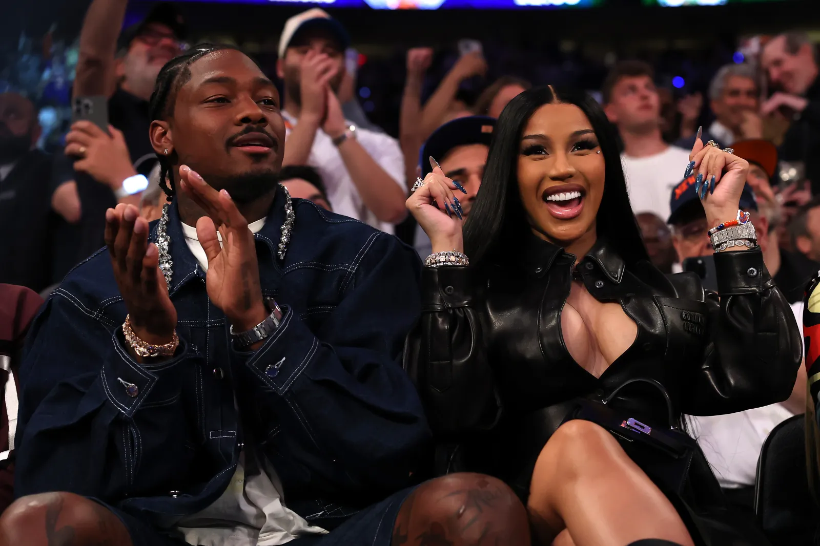 NEW YORK, NEW YORK – MAY 12: (L-R) NFL Player Stefon Diggs and rapper Cardi B sits court-side during the first quarter in Game Four of the Eastern Conference Second Round NBA Playoffs between the Boston Celtics and the New York Knicks at Madison Square Garden on May 12, 2025 in New York City.
