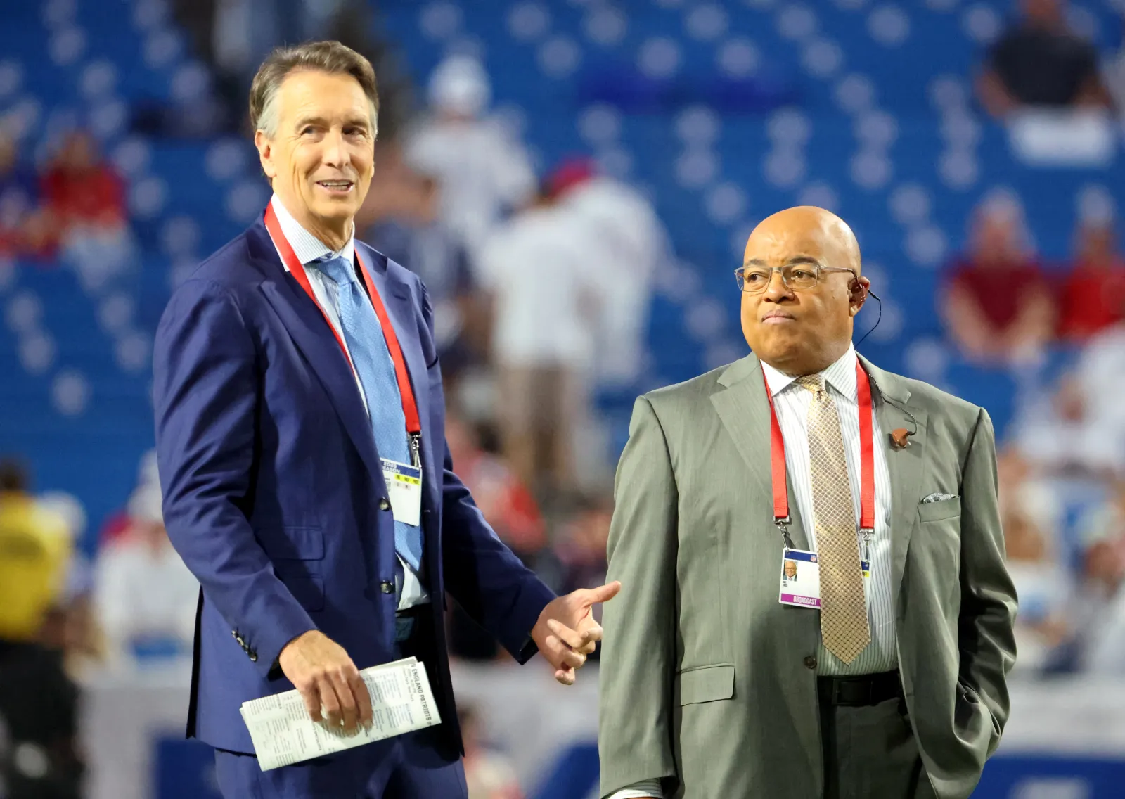 Sunday Night Football sportscasters Chris Collinsworth and Mike Tirico.