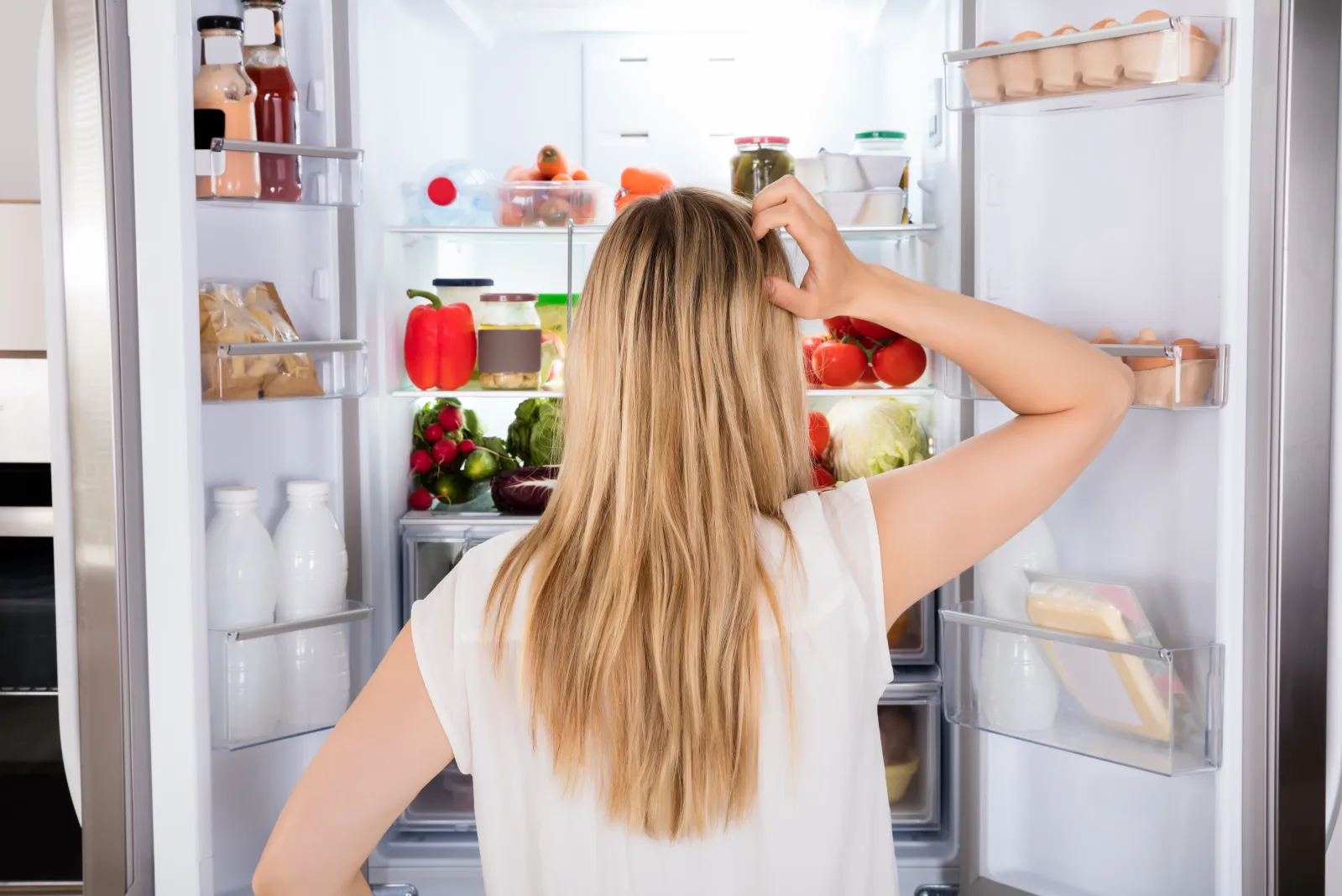 Millennial Woman Opens Fridge at Work, What She Finds Sparks Viral Debate