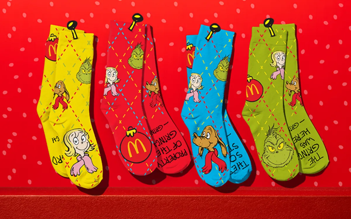 Four pairs of Grinch-themed socks.