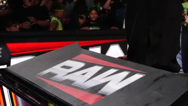 The announce desk for "WWE Monday Night Raw."