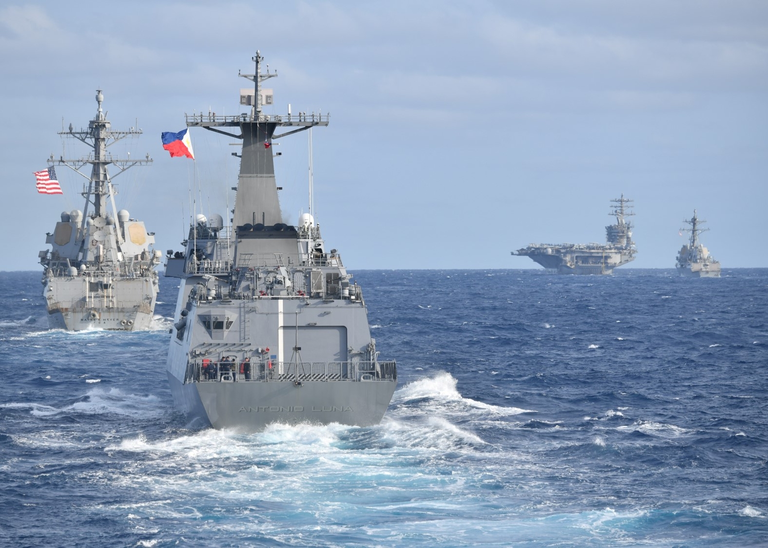 China Issues Warning as US Aircraft Carrier Patrols Contested Waters