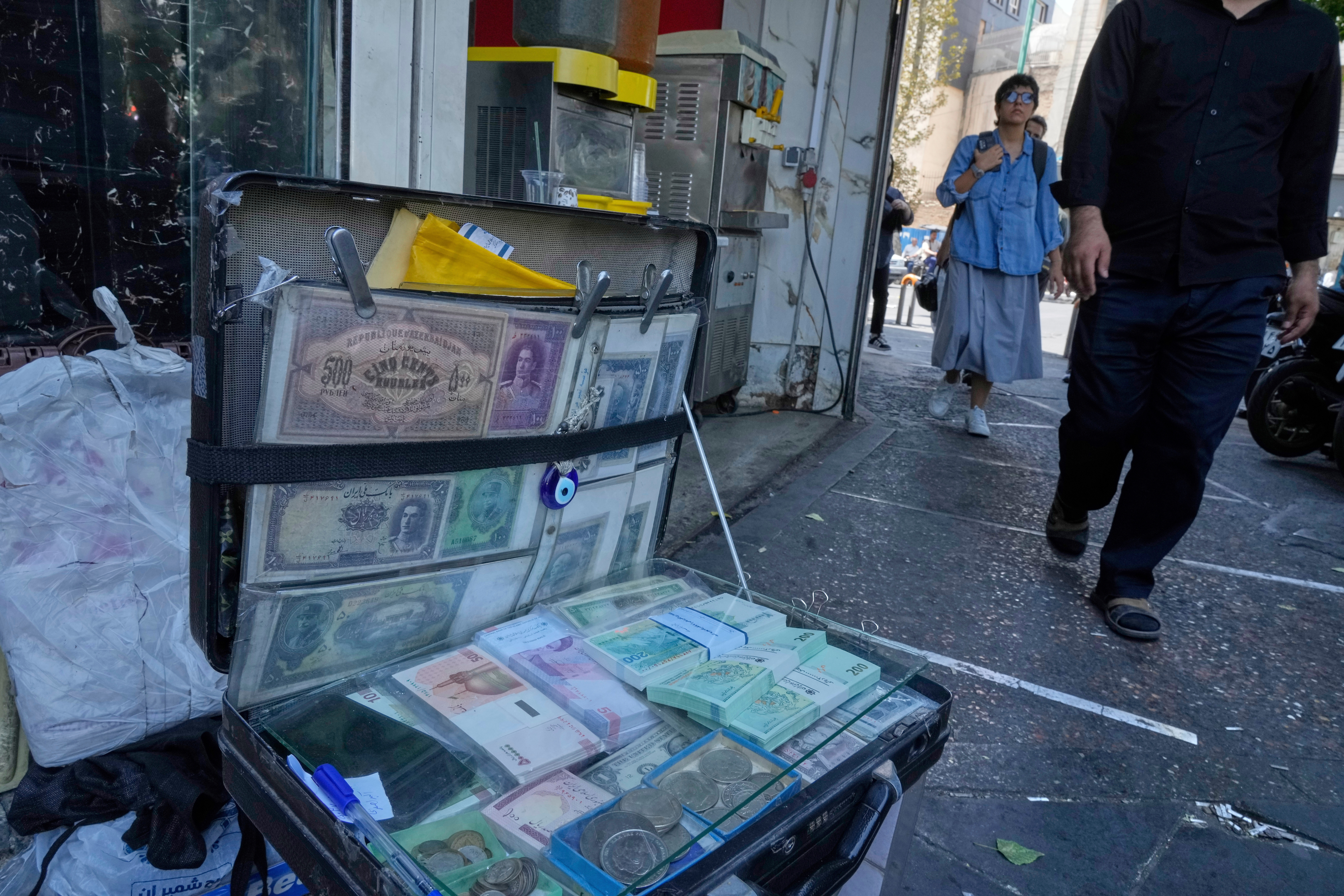 Iran Central Bank Chief Resigns, Protests Erupt Across Major Cities