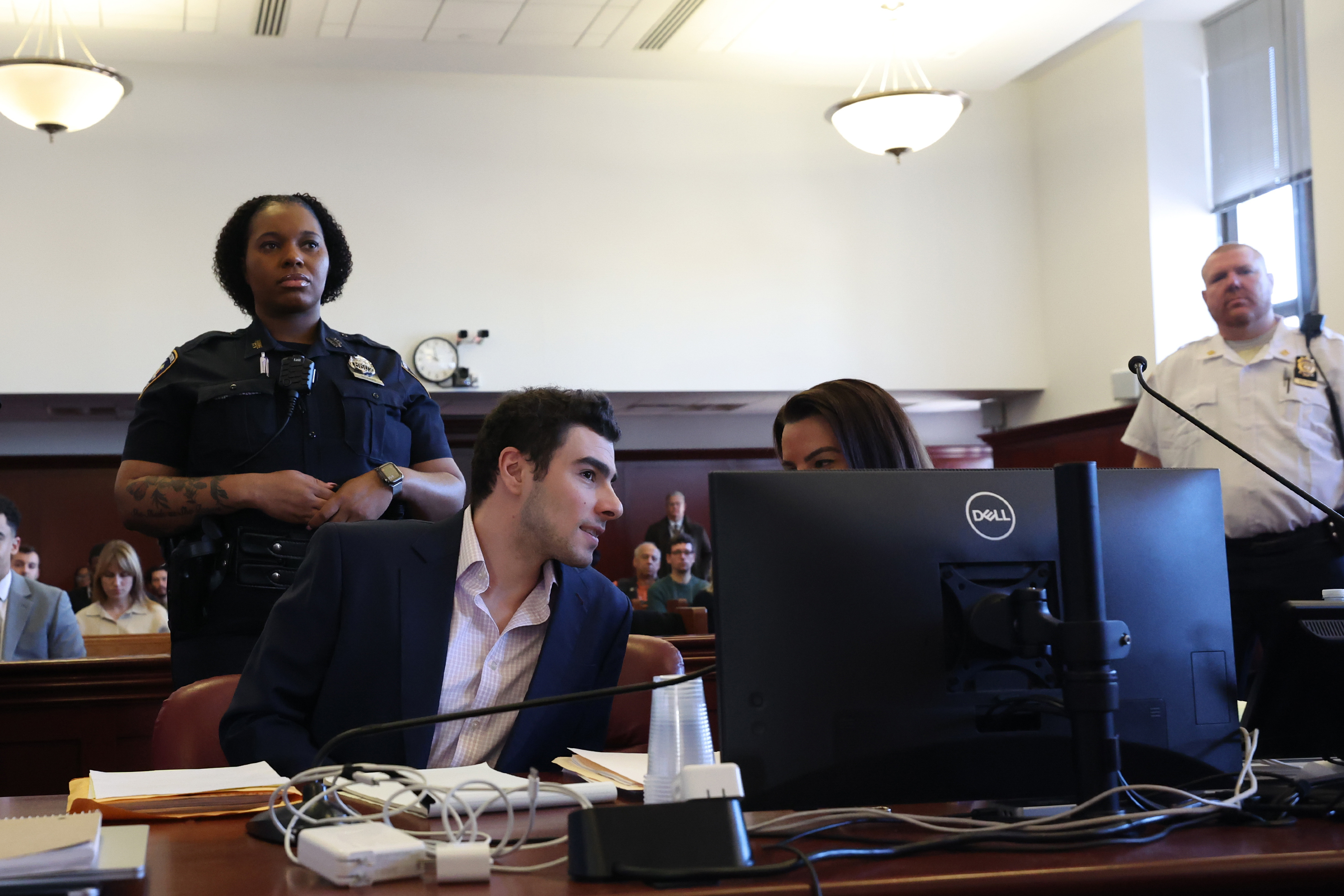Mangione Manhunt Cop Call Played in Court: 'We Might Have the Shooter'