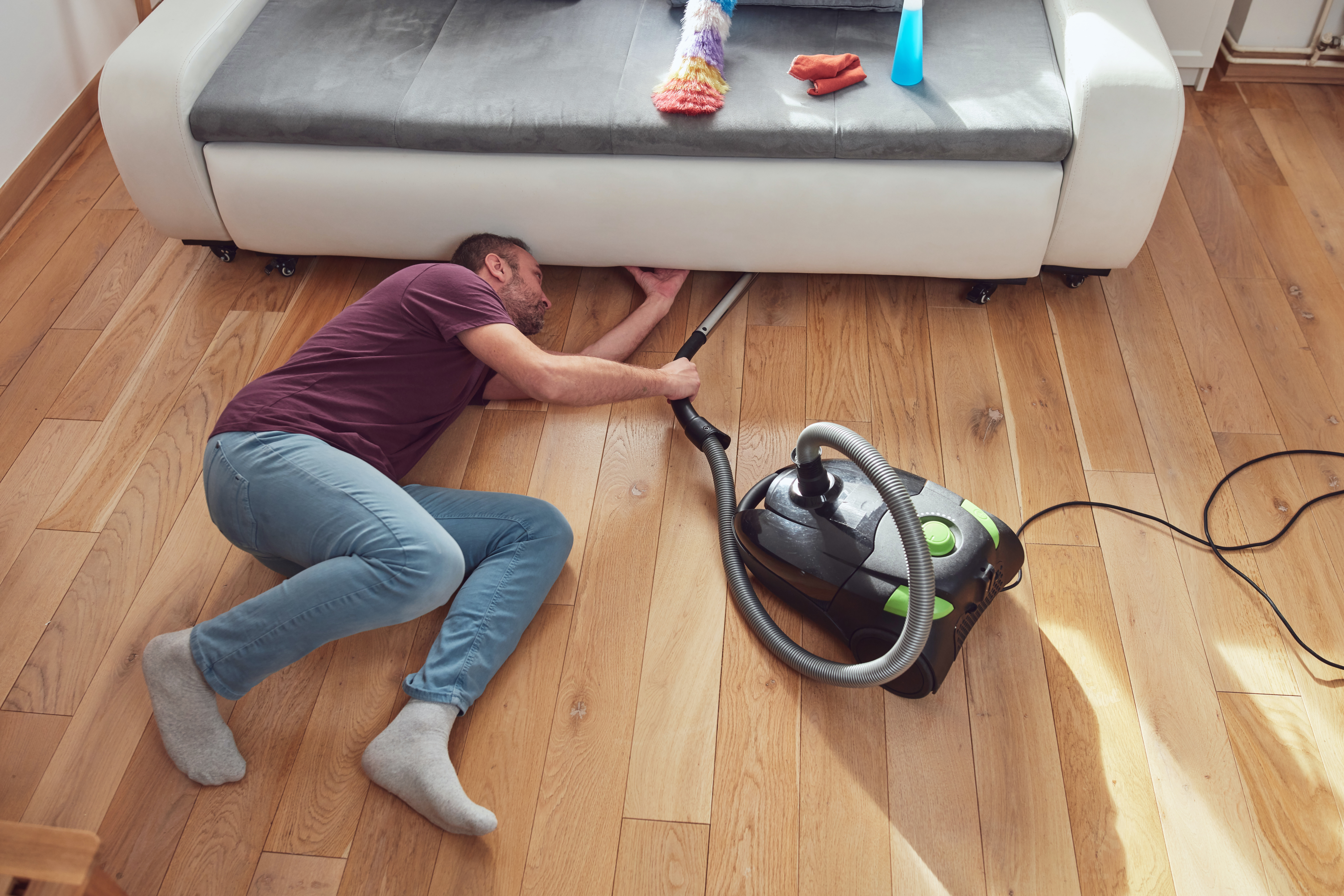 Man Moves Sofa To Deep Clean-Horror at ‘Strange Formation’ He Uncovers