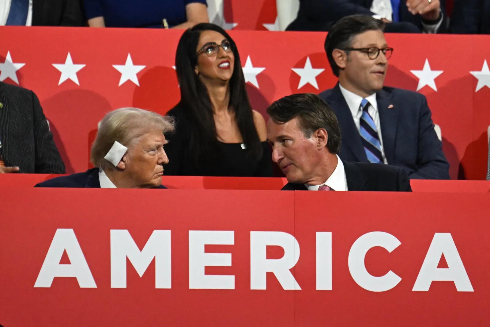 President Trump in front of US Representative Lauren Boebert (R-CO), at the 2024 Republican National Convention. (Photo by JIM WATSON/AFP via Getty Images)