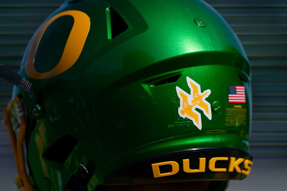 Tosh Lupoi's Commitment: A Testament to Oregon's Championship Aspirations